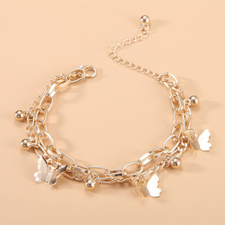 Bewitched Cystine Gold Butterfly Charm Bracelet
