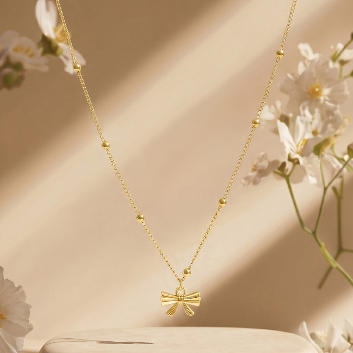Cici Bow-Styled Gold Love Necklace