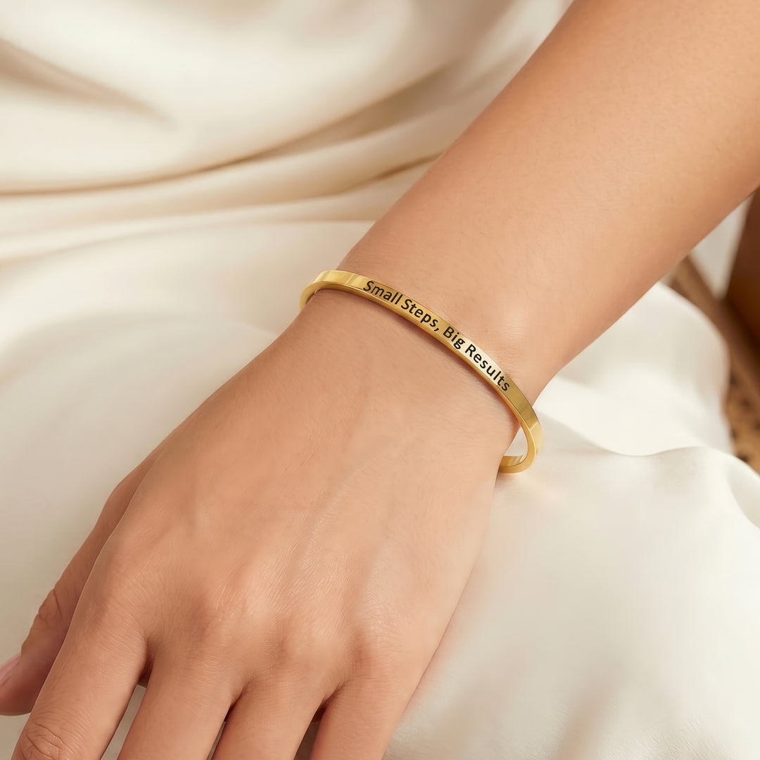 Small Steps, Big Results Gold Mantra Band