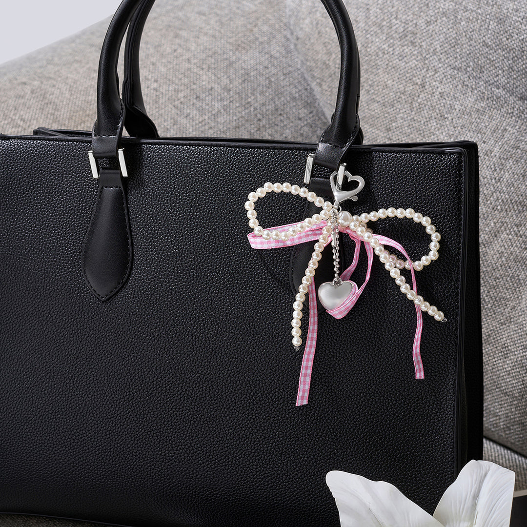 A Bow-Crush Pink Bag Charm
