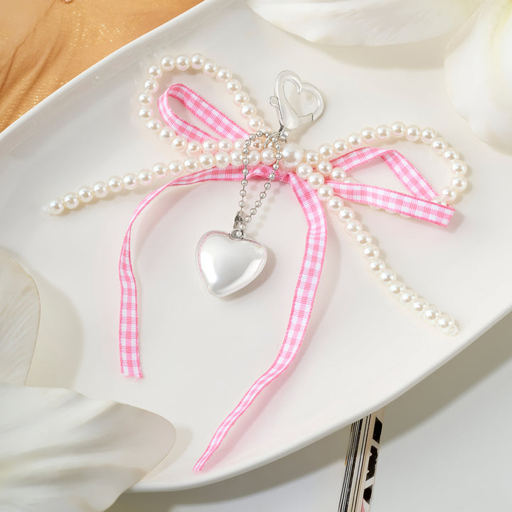 A Bow-Crush Pink Bag Charm