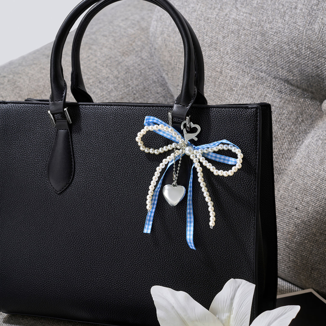 A Bow-Crush Blue Bag Charm