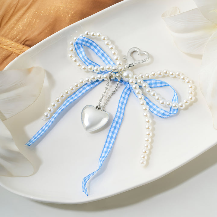 A Bow-Crush Blue Bag Charm