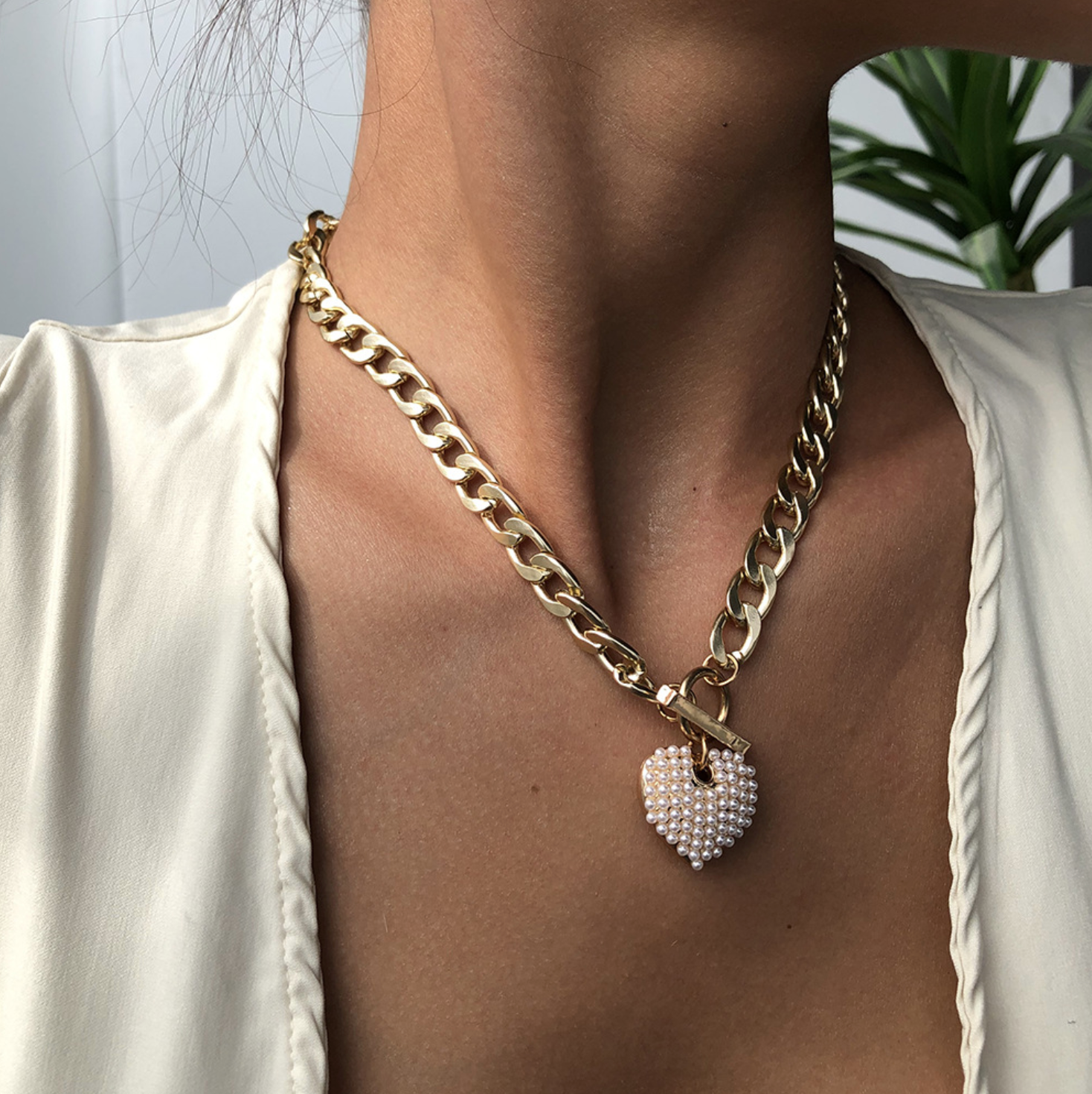 Chain link necklace with heart pendant on sale