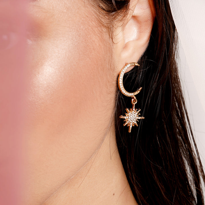 Star Hug Gold Dangler Earrings