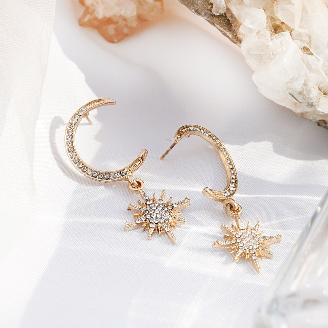 Star Hug Gold Dangler Earrings