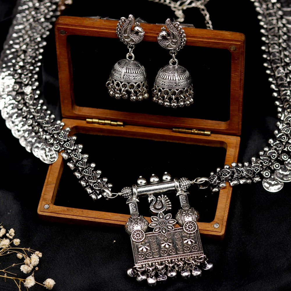 Kaveesha Silver Oxidized Peacock Necklace Set - Joker & Witch